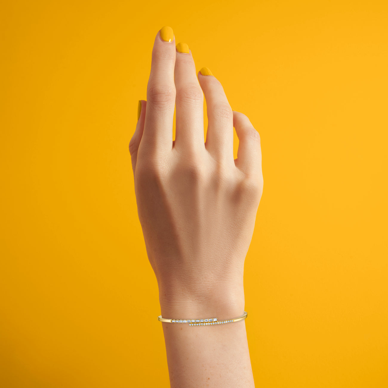 Hinged Bypass Bangle in Yellow Gold